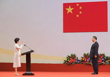 President Xi Jinping (right) swears in the Chief Executive, Mrs Carrie Lam (left), at the Inaugural Ceremony of the Fifth Term Government of the Hong Kong Special Administrative Region at the Hong Kong Convention and Exhibition Centre on July 1.